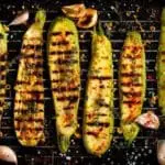 Grilled zucchini with herbs and garlic.
