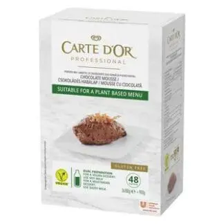 A box of Carte D'Or Chocolate Mousse Vegan 900g (3x300g) cake with an orange on top.