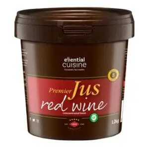 An Essential Cuisine Red Wine Jus 1kg container on a white background.