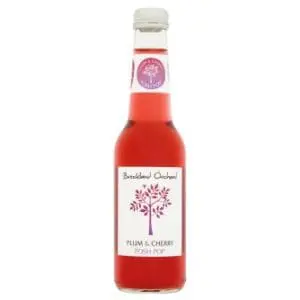 12x275ml of Breckland Orchard Plum & Cherry Posh Pop on a white background.
