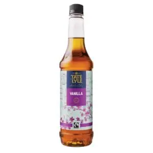 A bottle of Tate & Lyle Fairtrade Vanilla Coffee Syrup 750ml on a white background.