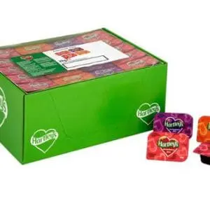 A green Hartleys Assorted Jam Portion Pots 100x20g box containing assorted jam portion pots in different flavors.