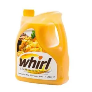 Four-liter container of Whirl Butter Substitute 4ltr, a liquid butter alternative, isolated on a white background.