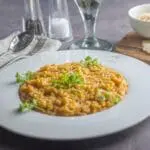 Delicious risotto on a white plate.
