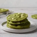 Matcha white chocolate cookies on plate.
