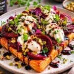 Burrata and balsamic glazed beetroot tart with pistachio crumb on puff pastry – recipe and image created by Nicol Retailer Limited