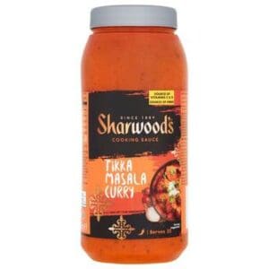 A bottle of Sharwood's Tikka Masala Curry Cooking Sauce 1x2.25kg on a white background.