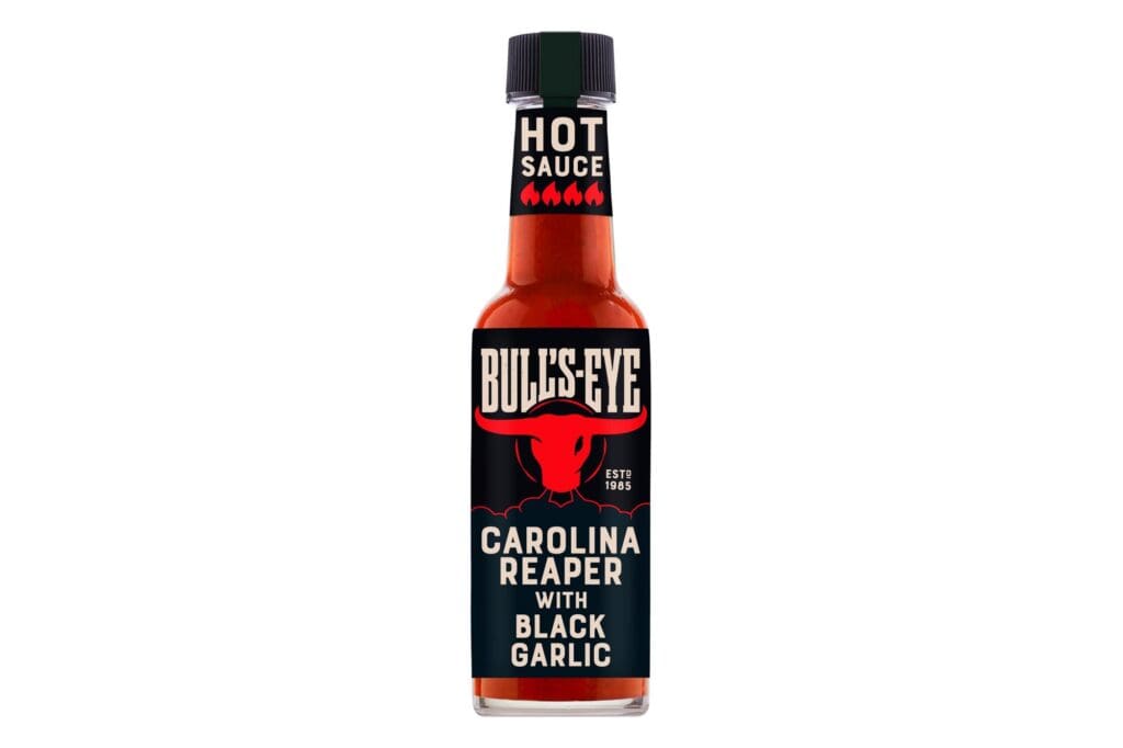 A bottle of Bulls-Eye Carolina Reaper Extra Hot Sauce 135ml with the label carolina reaper black.