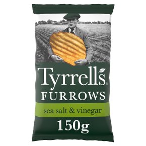 A bag of Tyrrells furrows sea salt & vinegar crisps 8x150g, featuring an image of a man in a cap holding a large chip, set against a farm background.