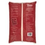A bag of Tilda Arborio Risotto Rice 5kg, featuring product details and cooking instructions.