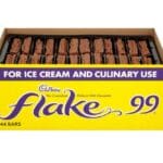 Box of Cadbury Flake 99 Bars 144x8.25g, labeled for ice cream and culinary use, isolated on a white background.