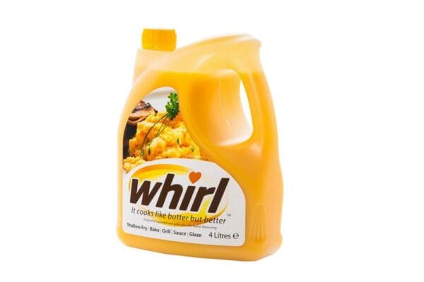 Four-liter container of Whirl Butter Substitute 4ltr, a liquid butter alternative, isolated on a white background.