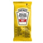 A yellow packet of Heinz English Mustard Classic Style Hot 250x7ml, displaying multiple languages and a "hot" label.