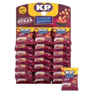 Display of KP Flavour Kravers Flame Grilled Steak Peanuts 21x50g in red packaging, arranged on a promotional stand with multiple rows.