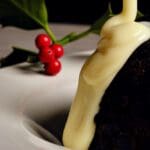 Christmas pudding with custard sauce.