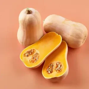 Here's an alt tag for the image: Whole and halved butternut squash.