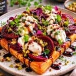 Burrata and balsamic glazed beetroot tart with pistachio crumb on puff pastry – recipe and image created by Nicol Retailer Limited